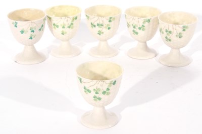 Lot 44 - Set of six Belleek egg cups decorated with...