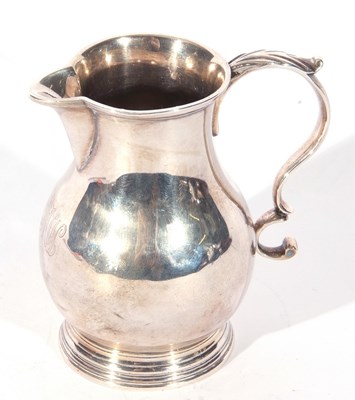 Lot 42 - George III silver sparrowbeak cream jug, the...