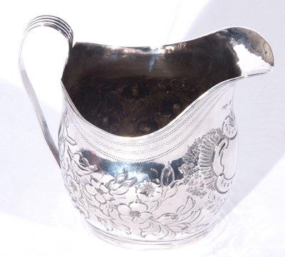 Lot 43 - George III silver helmet formed cream jug with...