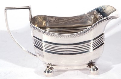 Lot 45 - Edward VII silver cream jug, the body with...