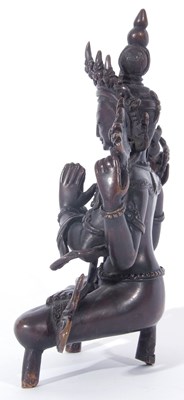 Lot 125 - Tibetan bronze figure of a Bodhisattva in...