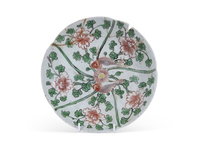 Lot 135 - Ming Dynasty scalloped dish with a design of...