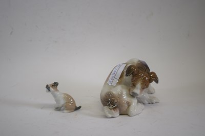 Lot 171 - A Lladro model of a terrier with butterfly...