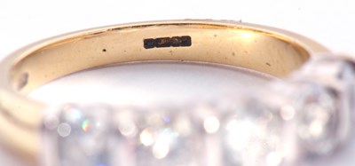 Lot 163 - Five stone diamond half hoop ring featuring...