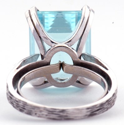 Lot 165 - Large aquamarine dress ring of stepped cut, 15....