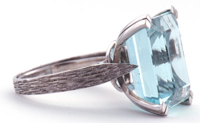 Lot 165 - Large aquamarine dress ring of stepped cut, 15....