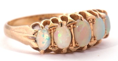 Lot 166 - 18ct gold five stone opal ring featuring five...