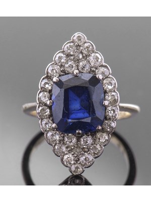 Lot 170 - Sapphire and diamond lozenge ring, the faceted...