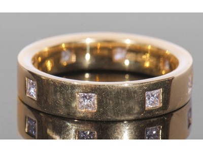 Lot 171 - Diamond set hand crafted full hoop ring, the...