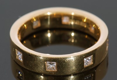 Lot 171 - Diamond set hand crafted full hoop ring, the...