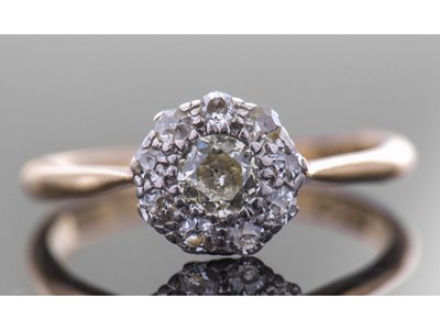 Lot 182 - Diamond cluster ring centring an old cut...
