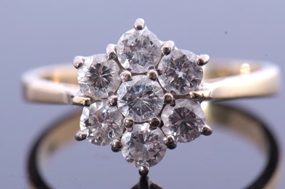 Lot 185 - Diamond cluster ring featuring seven round...