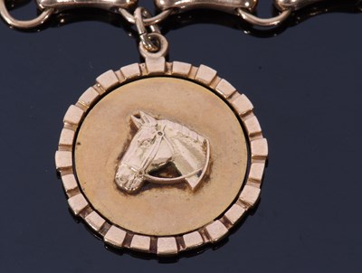 Lot 216 - 9ct gold bracelet and horse pendant, a design...