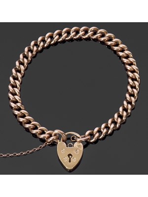 Lot 218 - 9ct gold curb link bracelet, half padlock...