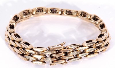 Lot 222 - 9ct gold fancy hollow link bracelet, 20cm long,...