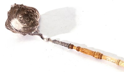 Lot 59 - William IV punch ladle with turned ivory...
