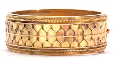 Lot 258 - Antique yellow metal wide hinged bracelet of...