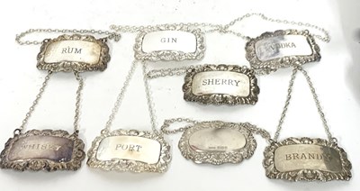 Lot 123 - Modern silver decanter label with suspension...