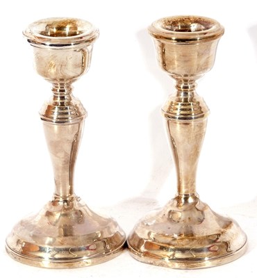 Lot 140 - Pair of George VI dressing table candlesticks...