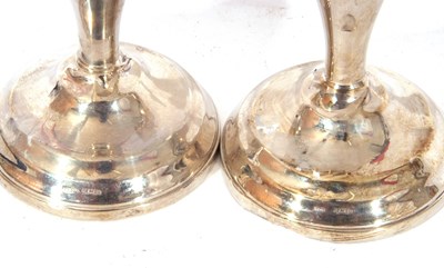 Lot 140 - Pair of George VI dressing table candlesticks...