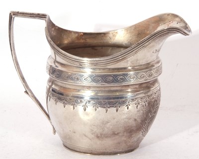 Lot 174 - George III helmet cream jug of waisted oval...
