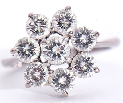 Lot 167 - Precious metal and diamond cluster ring...
