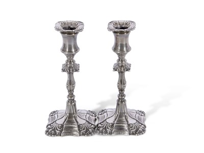 Lot 343 - Pair of Edwardian silver encased candlesticks...