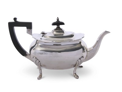 Lot 344 - Early 20th century silver tea pot of slightly...