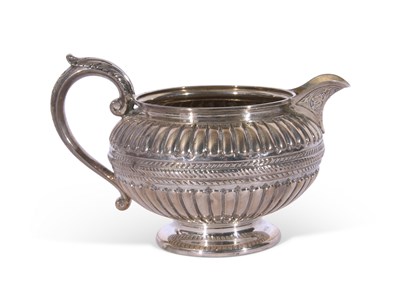 Lot 358 - Victorian silver cream jug of slightly...