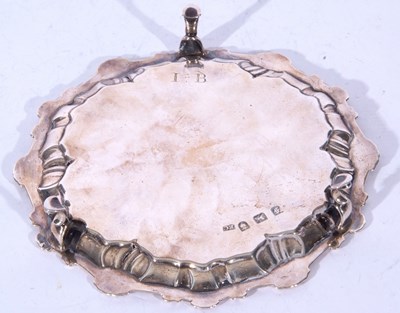 Lot 76 - George III small silver waiter tray with shell...