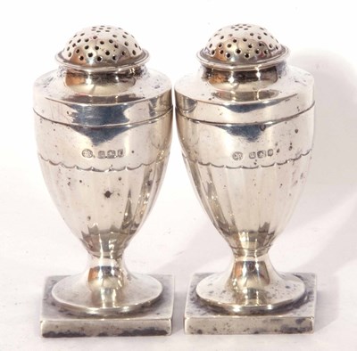 Lot 2 - Pair of late Victorian peppers of urn form...