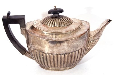 Lot 17 - Victorian silver tea pot in traditional half...