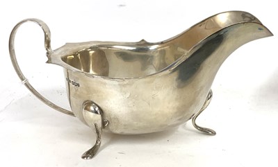 Lot 22 - George V silver sauce boat of typical form,...
