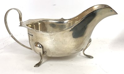 Lot 22 - George V silver sauce boat of typical form,...