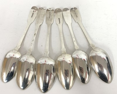 Lot 49 - 13 Georgian silver Fiddle pattern table spoons...