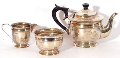 Lot 56 - George VI silver three piece tea set of slight...