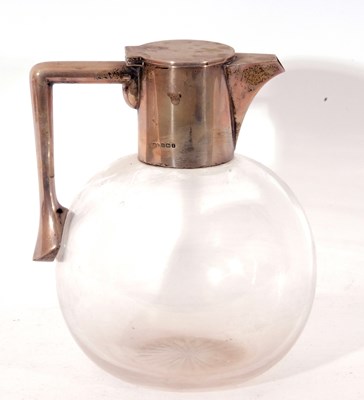 Lot 74 - George V silver and glass claret jug of plain...