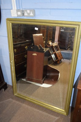 Lot 440 - Large 20th century bevelled wall mirror in a...
