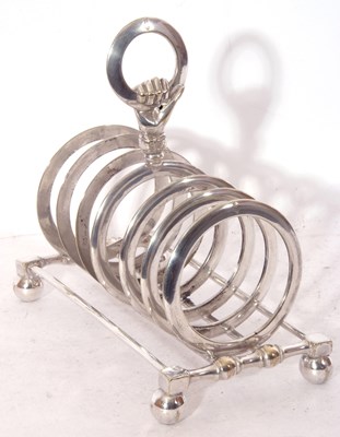 Lot 209 - Victorian silver plated toast rack featuring...