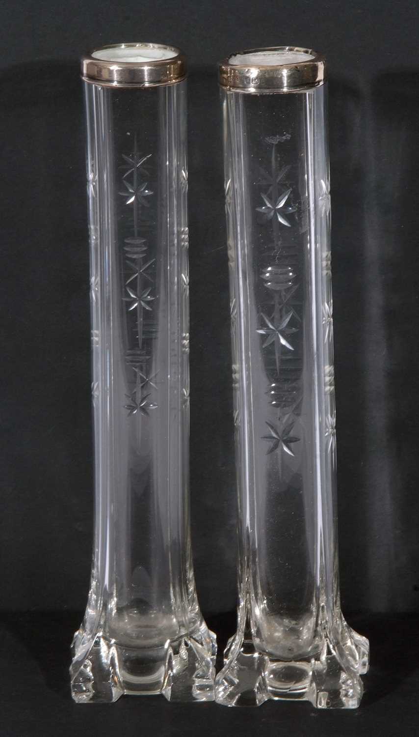 Lot 98 - Pair of Edward VII cut clear glass stem vases...
