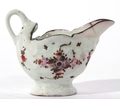 Lot 78 - A Lowestoft porcelain dolphin ewer decorated...