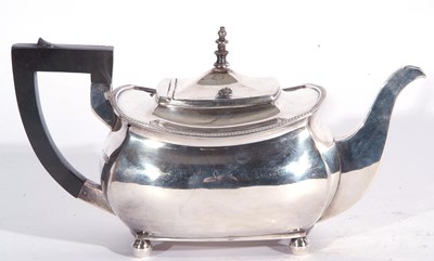 Lot 62 - A George V silver teapot of squat rectangular...