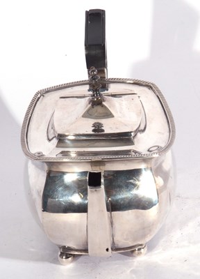 Lot 62 - A George V silver teapot of squat rectangular...