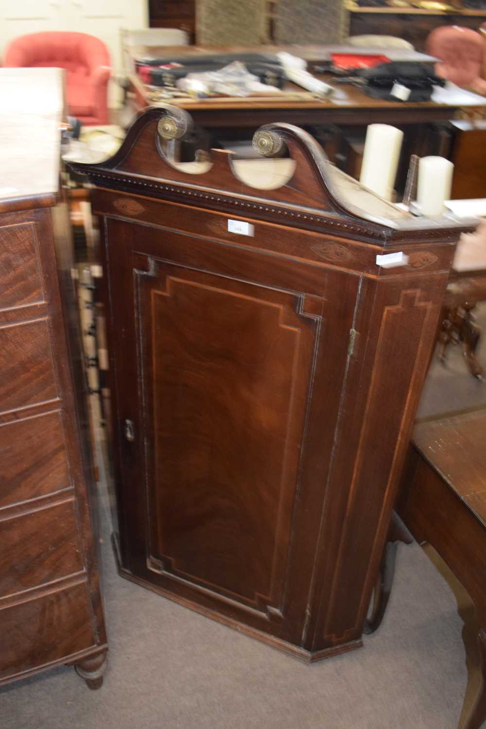 Lot 345 - Georgian mahogany wall mounted corner cabinet...