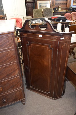 Lot 345 - Georgian mahogany wall mounted corner cabinet...