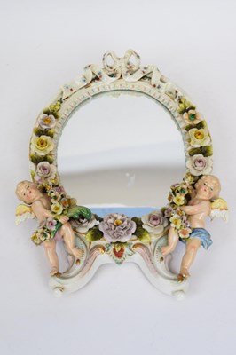 Lot 58 - Continental porcelain mirror, probably...