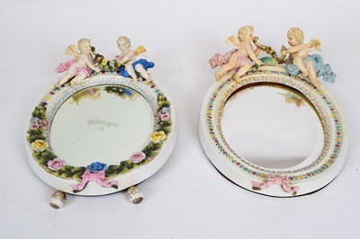 Lot 62 - Oval Continental porcelain mirror, probably...