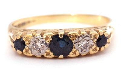 Lot 9 - 18ct gold sapphire and diamond ring featuring...