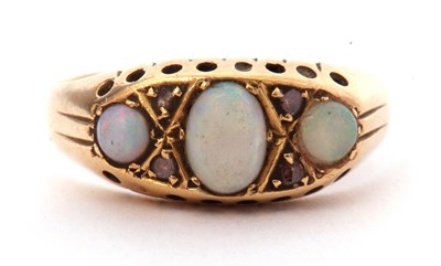 Lot 92 - Antique opal and diamond ring centring an oval...