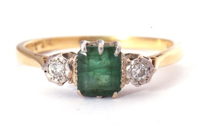 Lot 18 - Emerald and diamond three stone ring, the...